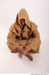 Joel Adamson Monk Sitting Pose